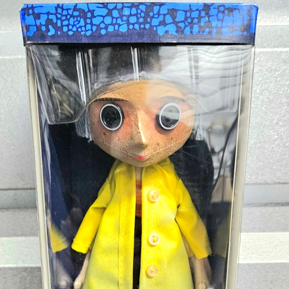 Yellow Raincoat Doll